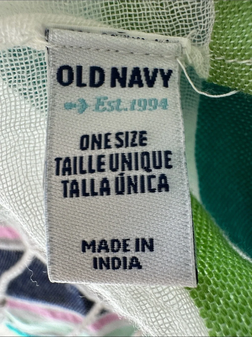 Old Navy white, navy, green and pink tasseled wrap.
